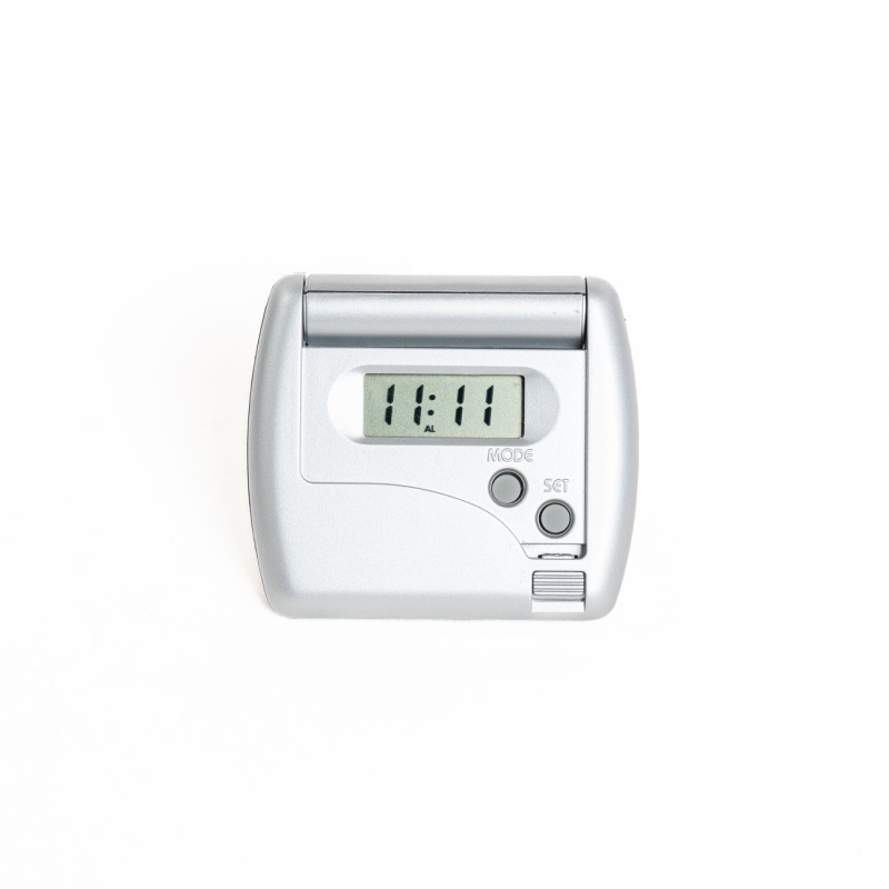 AC171.Reloj de viaje con sistema press up y alarma